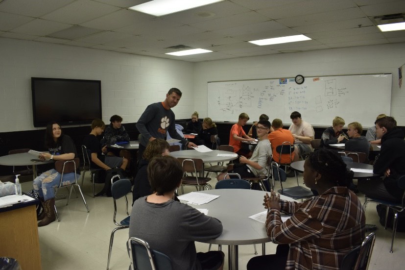 Mr. Cutright instructs students on the first day of class. 