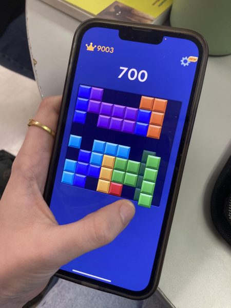 "Block Blast", a popular and highly addictive mobile game making its way on many students' phones.