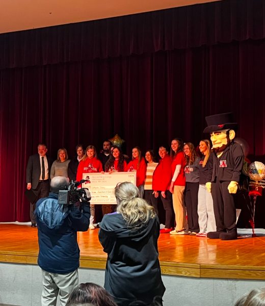 Award recipients line up for a photo.