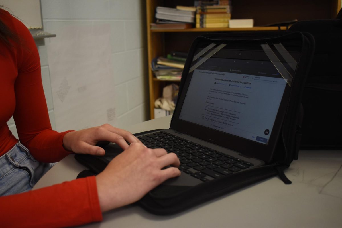 Student uses Khan Academy to take practice SAT skills.
